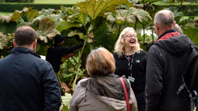 Visitors on a garden tour at Ightham Mote in Kent